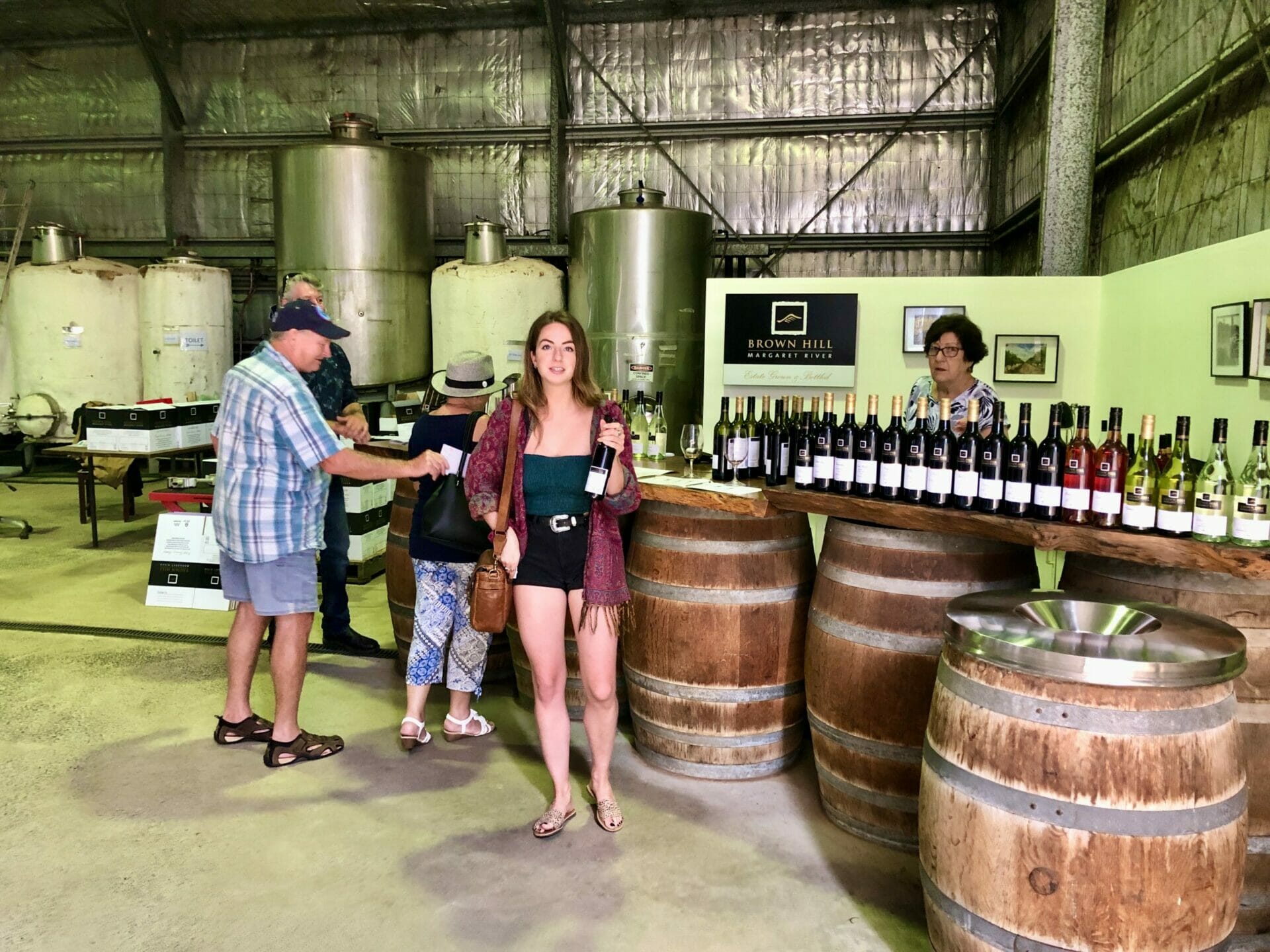 Girl at wine cellar door Margaret River Western Australia
