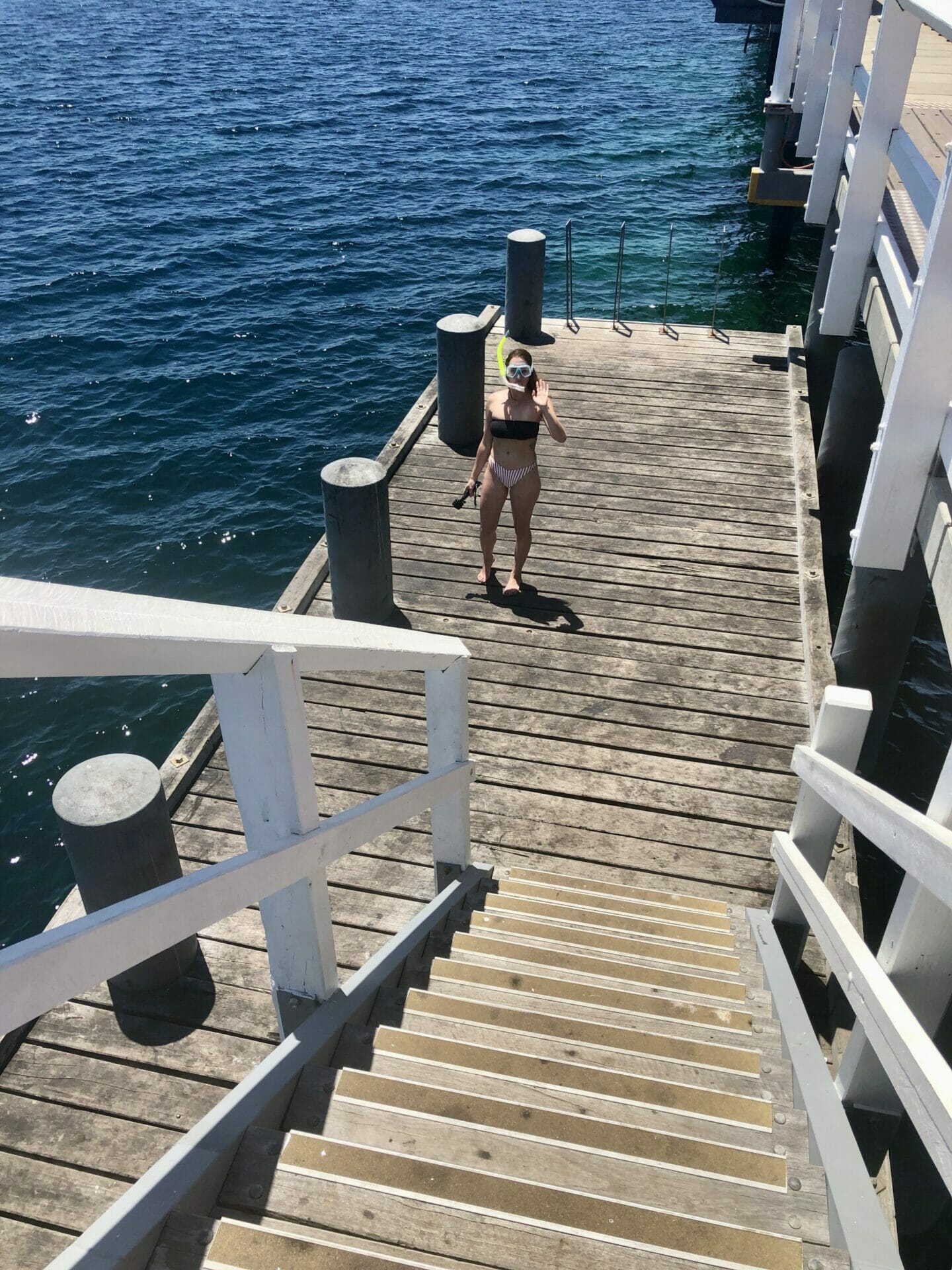 Girl snorkelling Busselton Jetty Perth Western Australia