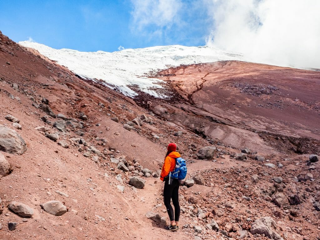 Girl hiking to Cotopaxi Glacier