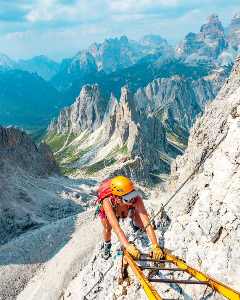 Ascending the ladders of Via Ferrata Merlone