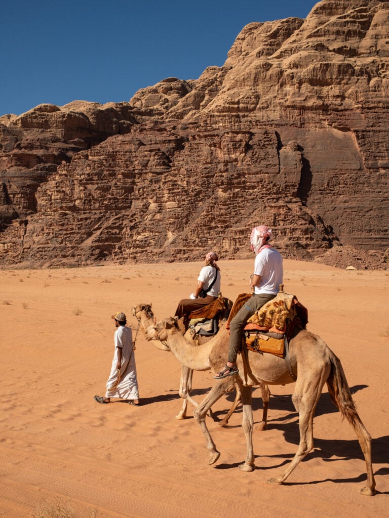 Riding camels in Wadi Rum